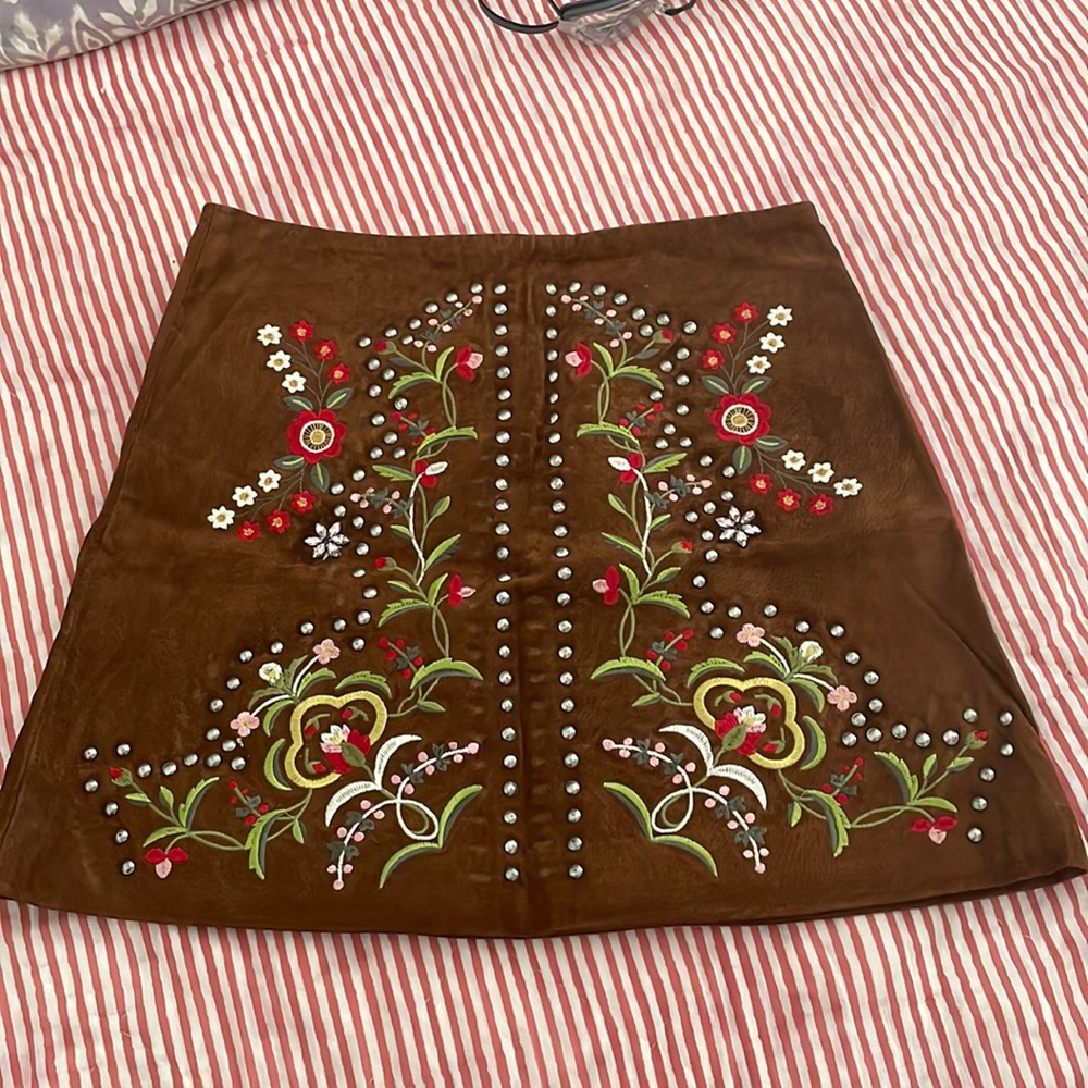 Embroidered suede mini skirt